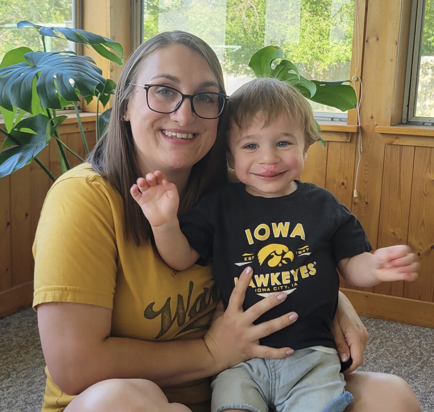 Kayla and Levi smiling at the camera together.