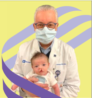 Doctor holding a baby